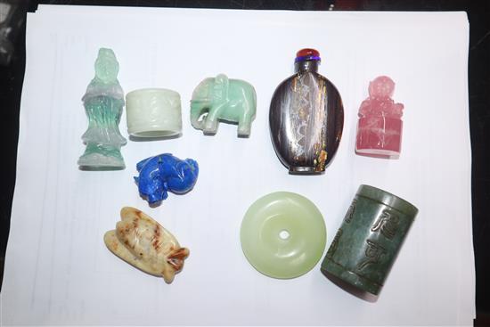 A group of Chinese stone carvings, a spinach green jade dish and a lapis lazuli dish